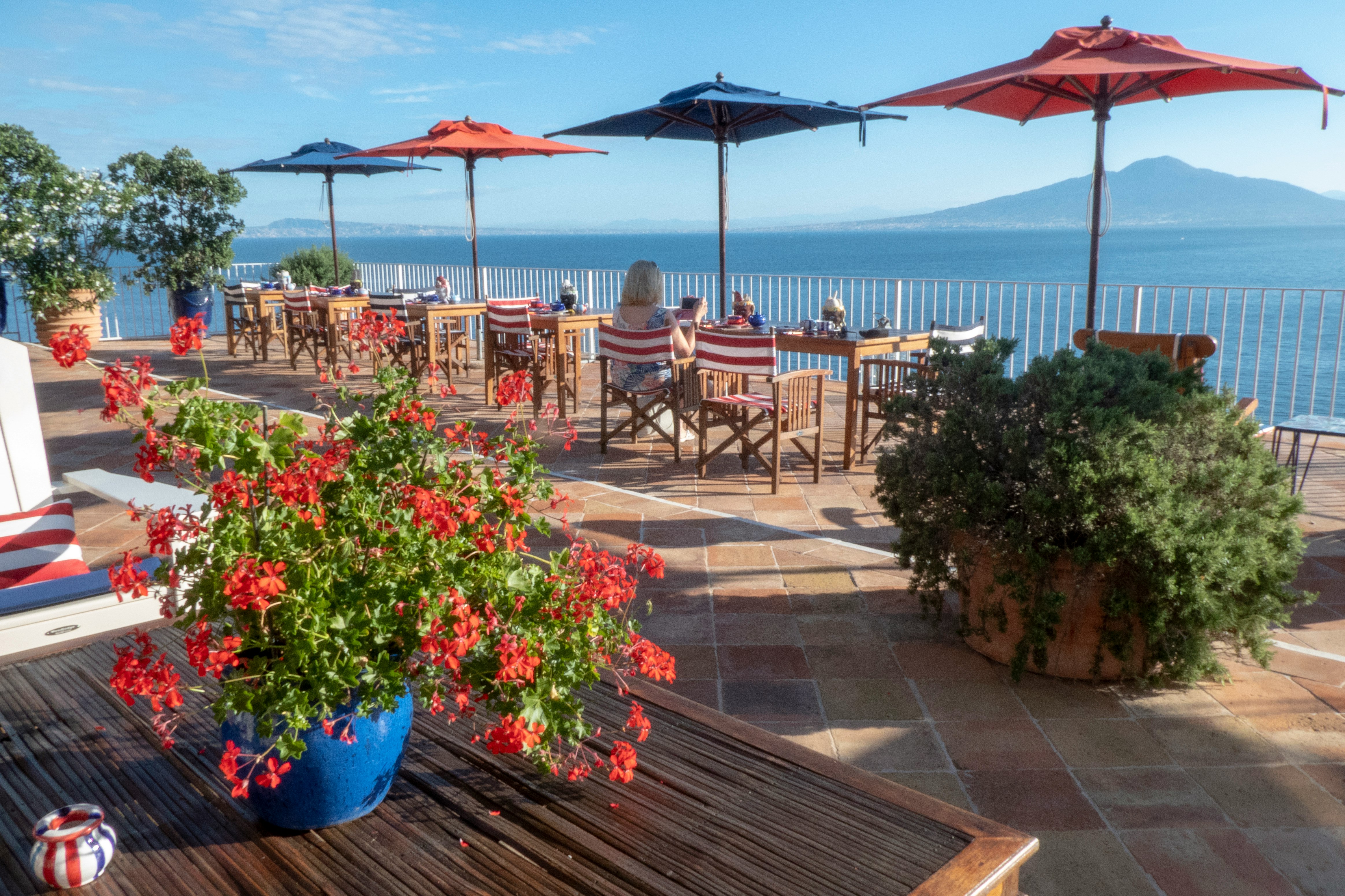 two blue and red patio umbrellas